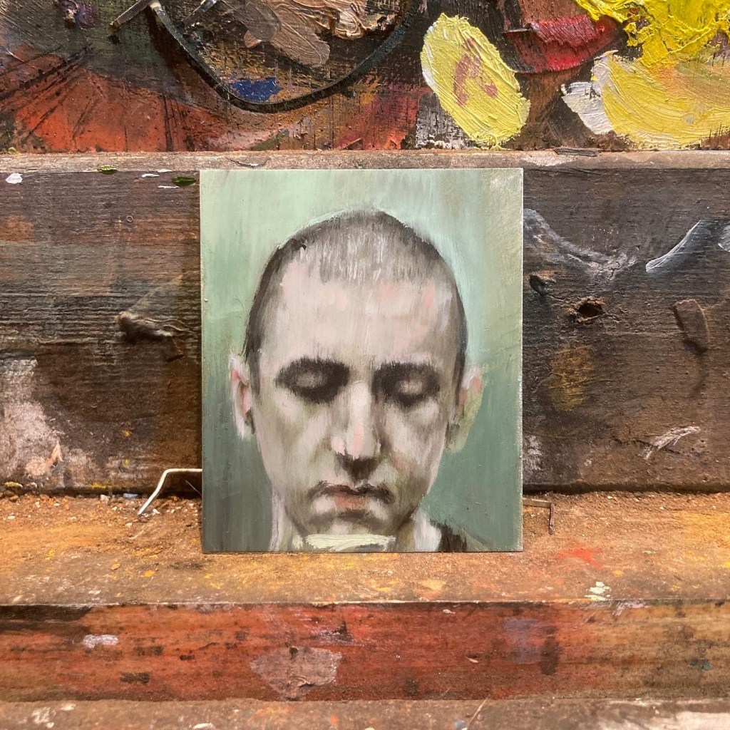 Small portrait of a man. Painted using oil on aluminium. Size 6x5cm.